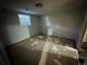 Unfinished basement featuring a small window with natural light at 1836 E Mineral Ave, Centennial, CO 80122