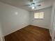 Cozy bedroom with hardwood floors, ceiling fan and natural light at 1836 E Mineral Ave, Centennial, CO 80122