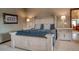 Comfortable bedroom with a large decorative bed, matching nightstands and a serene ambiance at 185 S Fuller Placer Rd, Breckenridge, CO 80424