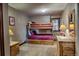 Cozy bedroom featuring a wood bunk bed, dresser, and bedside tables at 185 S Fuller Placer Rd, Breckenridge, CO 80424