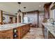Gourmet kitchen with custom cabinets and stainless steel appliances at 185 S Fuller Placer Rd, Breckenridge, CO 80424
