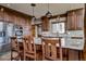 Kitchen featuring an island, granite countertops, and stainless steel appliances at 185 S Fuller Placer Rd, Breckenridge, CO 80424