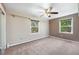 Cozy bedroom with neutral colors, natural light, and space for a relaxing retreat at 6150 Reed St, Arvada, CO 80003
