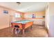 Game room featuring a pool table, tile floors, and bright lighting at 470 Mcdonnell St, Byers, CO 80103