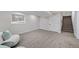 Finished basement with carpeted floors and lots of light at 7910 E Bethany Pl, Denver, CO 80231