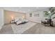 Main bedroom with a neutral color palette and plenty of natural light at 7910 E Bethany Pl, Denver, CO 80231