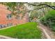 Exterior view of the lush green lawn and serene backyard at 1060 N Washington St # 1A, Denver, CO 80203