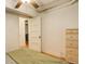 Bedroom featuring hardwood floors and doorway to dining area at 1060 N Washington St # 1A, Denver, CO 80203