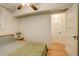 Bright bedroom featuring hardwood floors, a bedside table, and neutral tones at 1060 N Washington St # 1A, Denver, CO 80203