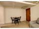 Charming dining area with seating for four, adjacent to an exterior door at 1060 N Washington St # 1A, Denver, CO 80203