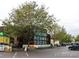 External view of a modern Whole Foods Market with ample parking and bike racks at 1060 N Washington St # 1A, Denver, CO 80203