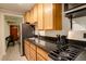 Well-equipped kitchen with stainless steel appliances and granite countertops at 1060 N Washington St # 1A, Denver, CO 80203