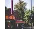 Restaurant with a neon breakfast sign and vintage architecture at 1060 N Washington St # 1A, Denver, CO 80203