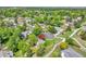 Aerial view of the home nestled among mature trees, located on a cul-de-sac in a quiet neighborhood at 3266 S Wabash Ct, Denver, CO 80231