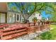 Multi-level backyard deck offers ample space for outdoor seating and enjoying the landscaped yard at 3266 S Wabash Ct, Denver, CO 80231