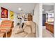 Finished basement with a workout area and doorway to bedroom at 3266 S Wabash Ct, Denver, CO 80231