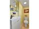 Small bathroom with modern sink and fixtures and a tiled floor at 3266 S Wabash Ct, Denver, CO 80231