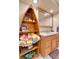 Bathroom featuring a vanity, mirror, and boat-shaped storage shelves for linens at 3266 S Wabash Ct, Denver, CO 80231