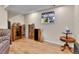 Inviting living room with wood floors, and shelving for storage and display at 3266 S Wabash Ct, Denver, CO 80231