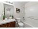 Updated bathroom with a modern vanity, a mirror, a sink, and a shower-tub combination at 3974 W 118Th Pl, Westminster, CO 80031
