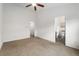 Spacious bedroom featuring a walk-in closet, neutral carpet and views to the bathroom at 3974 W 118Th Pl, Westminster, CO 80031