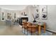 Elegant dining area with stylish decor, a fireplace, and views of the living room, perfect for hosting guests at 3974 W 118Th Pl, Westminster, CO 80031