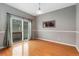Open dining area featuring wood floors, modern paint, a sliding glass door, and easy deck access at 3974 W 118Th Pl, Westminster, CO 80031