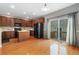 Spacious kitchen boasts wood floors, stainless appliances, a dining area, and a walk out deck at 3974 W 118Th Pl, Westminster, CO 80031