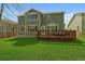 Lush backyard showcasing a spacious deck, ideal for outdoor entertaining at 10900 Parker Vista Rd, Parker, CO 80138