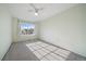 Airy bedroom with natural light, ceiling fan, and cozy carpet at 10900 Parker Vista Rd, Parker, CO 80138