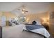 Serene main bedroom with ample natural light, comfortable seating, and a calming ambiance at 10900 Parker Vista Rd, Parker, CO 80138
