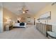 Main bedroom with a ceiling fan, neutral tones, and stylish decor at 10900 Parker Vista Rd, Parker, CO 80138