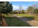 Scenic community walking path surrounded by lush greenery and mature trees at 10900 Parker Vista Rd, Parker, CO 80138