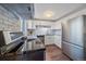 Bright kitchen with white cabinets, stainless steel appliances, and a subway tile backsplash at 3738 Miller Ct, Wheat Ridge, CO 80033