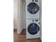 Efficiently stacked Samsung washer and dryer set in a utility area at 3738 Miller Ct, Wheat Ridge, CO 80033