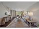 Open living room with contemporary decor, lots of natural light, and hardwood flooring at 3738 Miller Ct, Wheat Ridge, CO 80033