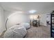 A stylish living room showcases a dining area, bean bag chairs, and modern decor at 3738 Miller Ct, Wheat Ridge, CO 80033