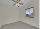 Spacious bedroom with carpeted floor and ceiling fan at 1177 S Rifle Cir, Aurora, CO 80017