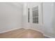 Bright bedroom with hardwood floors and bay windows at 8735 E 29Th Pl, Denver, CO 80238