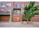 Exterior of home with multiple balconies and garage at 8735 E 29Th Pl, Denver, CO 80238