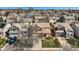 Attractive aerial shot of a residential area featuring tidy lawns, varied home styles, and mature trees at 6853 W Rockland Pl, Littleton, CO 80128
