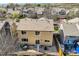 Overhead view of a backyard, complete with a patio area for outdoor dining and relaxation at 6853 W Rockland Pl, Littleton, CO 80128