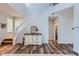 Inviting living area showcasing a staircase, stylish floors, and natural light at 6853 W Rockland Pl, Littleton, CO 80128