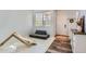 Entry way with wood flooring, white walls, and staircase with natural light at 6853 W Rockland Pl, Littleton, CO 80128