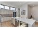 Well-lit kitchen with a large island, stainless steel appliances, and hardwood floors throughout at 2442 Champa St, Denver, CO 80205