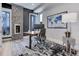 Contemporary home office featuring a fireplace, modern desk, and stylish decor at 2442 Champa St, Denver, CO 80205
