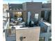 Inviting rooftop deck with outdoor seating, grill, and views into a cozy living space, perfect for entertaining at 2442 Champa St, Denver, CO 80205