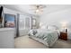 Bedroom featuring neutral walls, carpet, and large window at 2534 Valley Oak Rd, Castle Rock, CO 80104