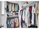 Organized walk-in closet with ample shelving and hanging space for clothes and accessories at 4309 S Coors Ct, Morrison, CO 80465