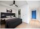 Bedroom with walk-in closet and blue door at 1750 Wewatta St # 1536, Denver, CO 80202